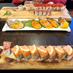 Mussels, spicy tuna roll, red dragon roll Mussels, spicy tuna roll, red dragon roll