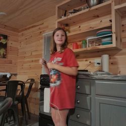 Kin Cabins - The granddaughter doing her thing!