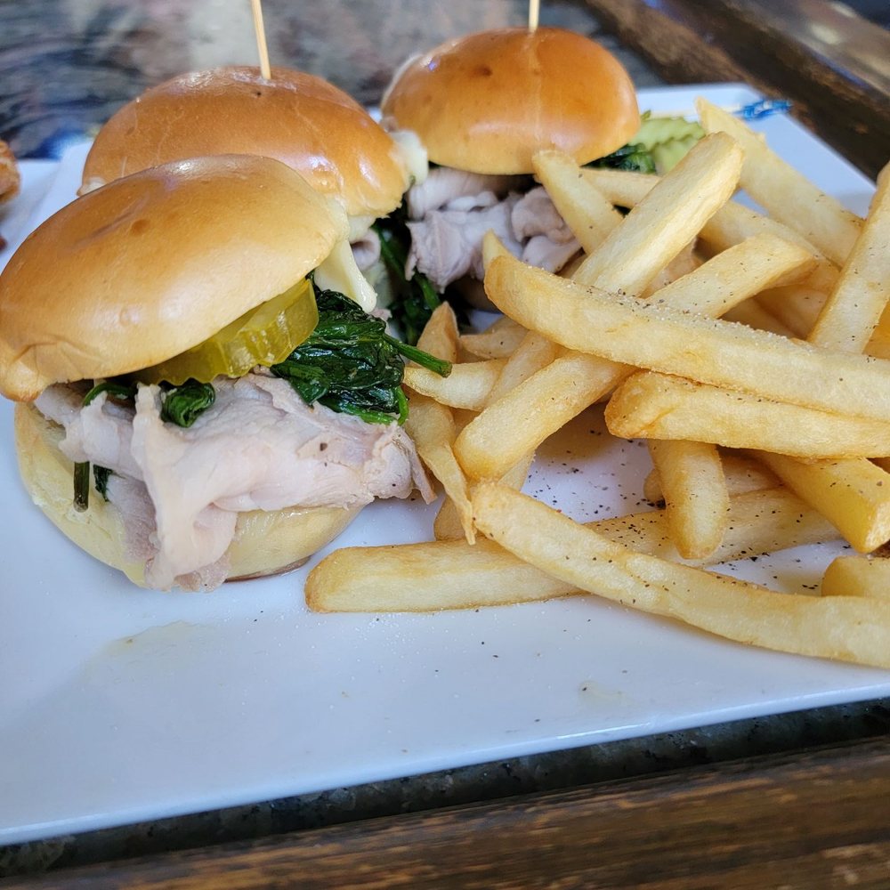Pork sliders and fries during happy hour Pork sliders and fries during happy hour