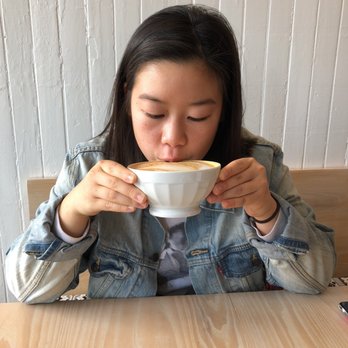 Vergennes Laundry by CK - Sip sip of her almond latte - Coffee & Tea Near Me - Vergennes, Vermont