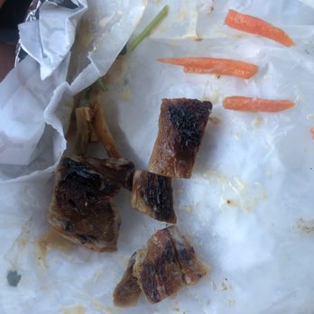 WaBa Grill - Burnt pieces from my WaBa chicken wrap - Fast Food Near Me - Apple Valley, California WaBa Grill - Burnt pieces from my WaBa chicken wrap - Fast Food Near Me - Apple Valley, California