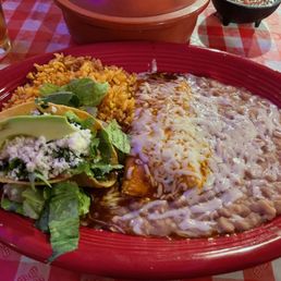 Two item combo with shredded crispy taco, cheese enchilada, rice and beans.
