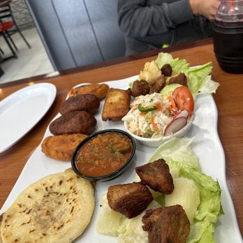 La Casita - Plato tipico: fried yucca & pork, salad, salsa, 1 tamale , 1 pupusa, 2 empanadas , 2 fried stuff plantains (one bean, one cheese) $29.99 - Salvadoran Near Me - Torrance, California La Casita - Plato tipico: fried yucca & pork, salad, salsa, 1 tamale , 1 pupusa, 2 empanadas , 2 fried stuff plantains (one bean, one cheese) $29.99 - Salvadoran Near Me - Torrance, California