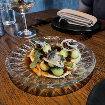 Hestia - I forgot we ordered this but it was so good! Cucumbers with an XO sauce. - New American Near Me - Austin, Texas Hestia - I forgot we ordered this but it was so good! Cucumbers with an XO sauce. - New American Near Me - Austin, Texas