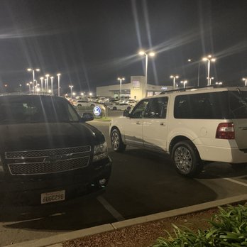 Razzari Ford - Old 2007 Chevy Tahoe (Left)  New 2012 Ford Expedition EL (Right) - Car Dealers Near Me - Merced, California