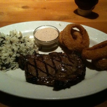 Black Angus Steakhouse - Ribeye with wild rice & onion rings - Steakhouses Near Me - Torrance, California Black Angus Steakhouse - Ribeye with wild rice & onion rings - Steakhouses Near Me - Torrance, California
