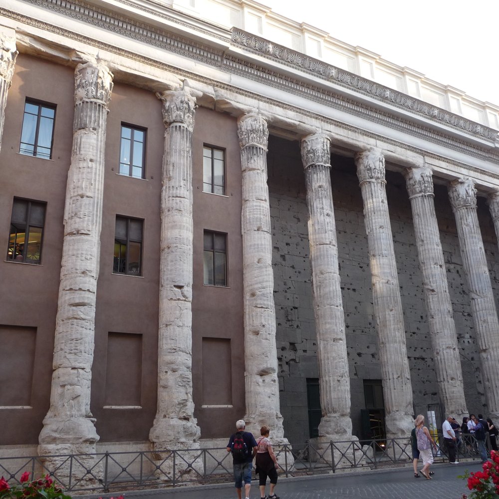 The view of the 'Temple of Hadrian' from Osteria dell'ingegno - the 'temple' is now a bank HQ and also the Rome Chamber of The view of the 'Temple of Hadrian' from Osteria dell'ingegno - the 'temple' is now a bank HQ and also the Rome Chamber of