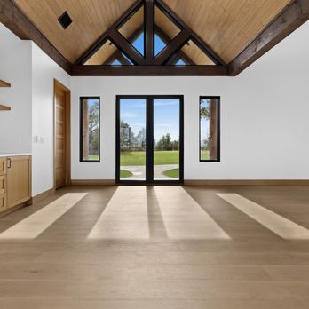 AGC Home Remodeling - Austin new build with luxury kitchenette, oak cabinetry, geometric tile backsplash, vaulted ceiling, and panoramic views. - General Contractors Near Me - Austin, Texas