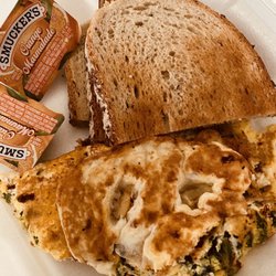 Jerri's Luncheonette - After the morning walk, this spinach feta omelette with rye toast and a side order of grits hit the spot