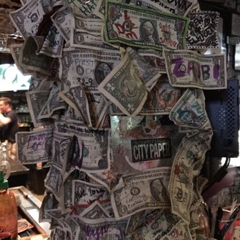 The Griffon - Raining money! Singles everywhere - Pubs Near Me - Charleston, South Carolina