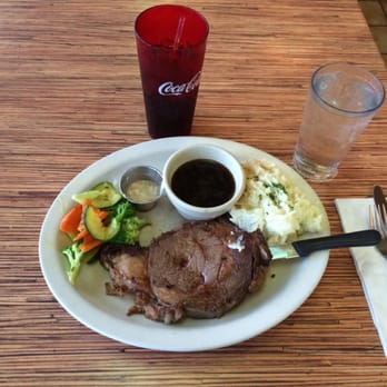 Coconut Grill - 10 oz slow roasted prime rib with garlic mashed potatos. Looks & tastes great! - American Near Me - Hilo, Hawaii Coconut Grill - 10 oz slow roasted prime rib with garlic mashed potatos. Looks & tastes great! - American Near Me - Hilo, Hawaii