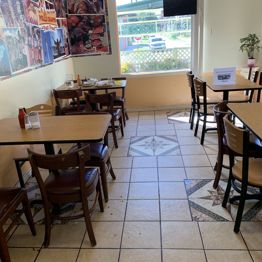 Pollo Chapin - tables and chairs in a restaurant - Mexican Near Me - Detroit, Michigan Pollo Chapin - tables and chairs in a restaurant - Mexican Near Me - Detroit, Michigan