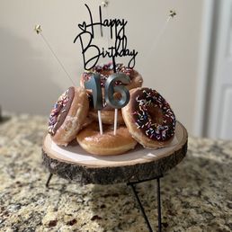 Donut cake of Sprinkle and a couple of glazed