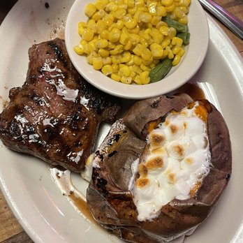 Texas Roadhouse - New York strip 8oz with buttered corn and loaded sweet potato - Steakhouses Near Me - Manassas, Virginia Texas Roadhouse - New York strip 8oz with buttered corn and loaded sweet potato - Steakhouses Near Me - Manassas, Virginia