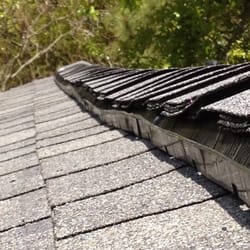 Lowe's Home Improvement - New roof by lowes. This is crap.