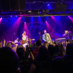 a band performing on stage