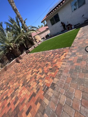 Paver Installation - Las Vegas is known to be a desert; rock, dirt, & dying plants.
BORING! For this landscape project we installed a brand new irrigation system with desert drought resistant plants. We added a beautiful green & lush turf that can manage heavy traffic! Perfect for kids, pets and any outdoor activity. We included a paver patio that can be used to set outdoor furniture & enjoy a morning coffee. We are ready for your next outdoor project! Paver Installation - Las Vegas is known to be a desert; rock, dirt, & dying plants.
BORING! For this landscape project we installed a brand new irrigation system with desert drought resistant plants. We added a beautiful green & lush turf that can manage heavy traffic! Perfect for kids, pets and any outdoor activity. We included a paver patio that can be used to set outdoor furniture & enjoy a morning coffee. We are ready for your next outdoor project!