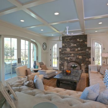 Koral Bros - a living room with couches and a fireplace - General Contractors Near Me - Southampton, New York Koral Bros - a living room with couches and a fireplace - General Contractors Near Me - Southampton, New York