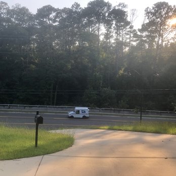 Far Beyond Moving - This driveway is so steep you can't even see half of it. It just drops away. - Movers Near Me - Warner Robins, Georgia