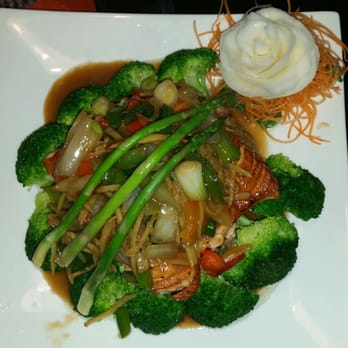 Bahn Thai Restaurant - Glazed salmon with ginger on top of brown rice with broccoli and asparagus.... Beautiful presentation.... - Thai Near Me - Tallahassee, Florida Bahn Thai Restaurant - Glazed salmon with ginger on top of brown rice with broccoli and asparagus.... Beautiful presentation.... - Thai Near Me - Tallahassee, Florida