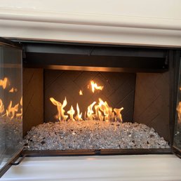 Gas fire with silver and white stones Gas fire with silver and white stones