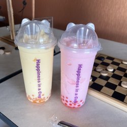 Boo Boba - Coconut mango smoothie w mango boba on the left Strawberry vanilla on the right with strawberry boba
