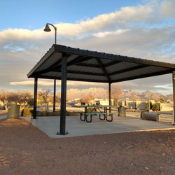 Covered picnic table with a gorgeous view of the Organ Mountains.