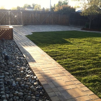 Nine Orange Landscaping - Our dog run, with new pavers and sod. - Landscaping Near Me