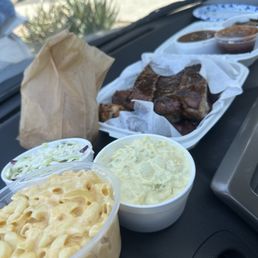 Mac and cheese, cole slaw, potato salad, corn bread, baked beans, collared greens, with "The Works"! Mac and cheese, cole slaw, potato salad, corn bread, baked beans, collared greens, with "The Works"!