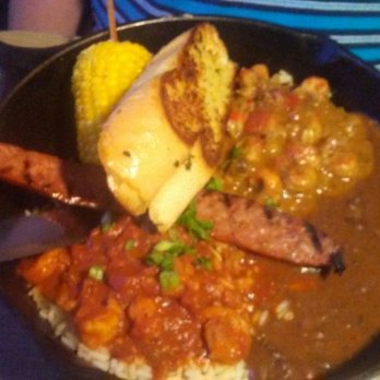 Razzoo's Cajun Cafe - Cajun Combo Skillet...Grilled Andouille sausage, shrimp creole, crawfish etoufee and red beans and rice. - Seafood Near Me - Pasadena, Texas Razzoo's Cajun Cafe - Cajun Combo Skillet...Grilled Andouille sausage, shrimp creole, crawfish etoufee and red beans and rice. - Seafood Near Me - Pasadena, Texas