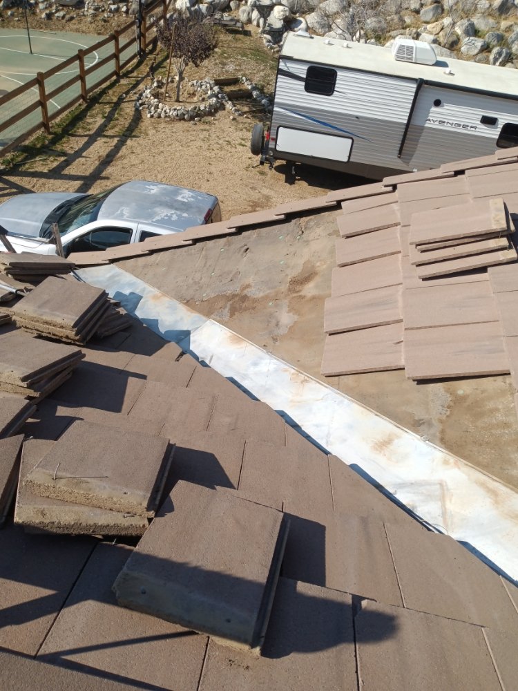 Slide of Moses Roofing