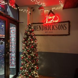 a christmas tree in front of a store