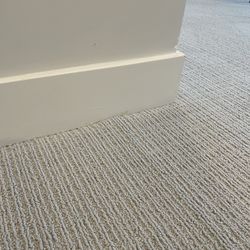 Kevin's Carpets - Snags, buckled edges, elevated seams.