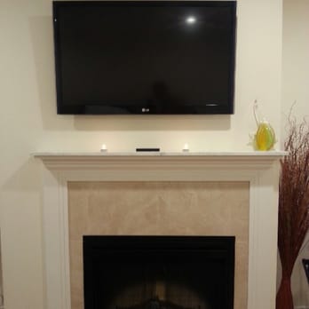 Bricco Suites - TV over the fireplace - Hotels Near Me - Boston, Massachusetts Bricco Suites - TV over the fireplace - Hotels Near Me - Boston, Massachusetts