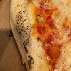 Charlie's Pizza - Oh - there is the cooked part from the dirty paddle