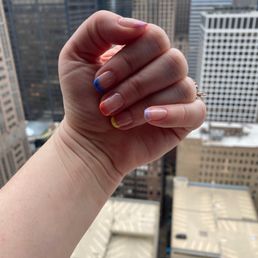 Fun little French Manicure and in record time. Totally recommend checking this place out!