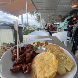 Tres Palos Bar and Grill - 1/2 Carne Ahumada with Tostones de Pana