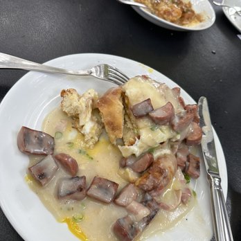 Evangeline - Biscuit and gravy with an added egg, andouille sausage and shrimp and grits. - Cajun/Creole Near Me - Calistoga, California Evangeline - Biscuit and gravy with an added egg, andouille sausage and shrimp and grits. - Cajun/Creole Near Me - Calistoga, California