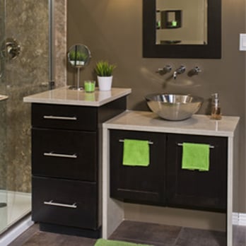 Re-Bath - a sink and shower in a bathroom - General Contractors Near Me - Des Moines, Iowa Re-Bath - a sink and shower in a bathroom - General Contractors Near Me - Des Moines, Iowa