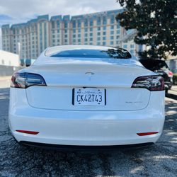 RIYE Group - Tesla Model 3 in white rear angle.