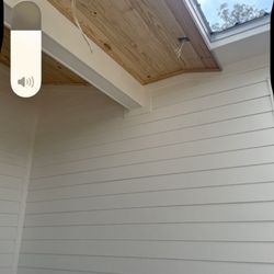 K J and Sons Construction - Hardy Board Siding with tongue and grew wood ceilings on the porch and soffits