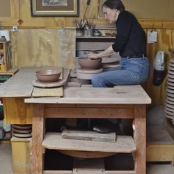 Pioneer Pottery - Janet Hero Dodge on the potter's kick wheel