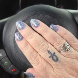 Imagine Nails & Spa - My sparklies. This is so not normal for me but my son wanted this nail color. So there I went!!!! Love it!