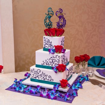 Columbia Midtown Florist - Cake decorated with orchids and roses with rosebud shot glasses. - Florists Near Me - New York, New York