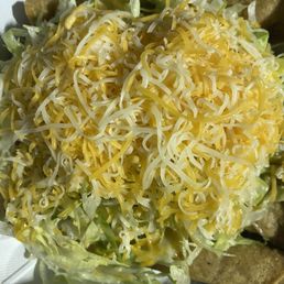 5 Rolled Tacos with Guacamole, Cheese, and Lettuce - 7/10 5 Rolled Tacos with Guacamole, Cheese, and Lettuce - 7/10