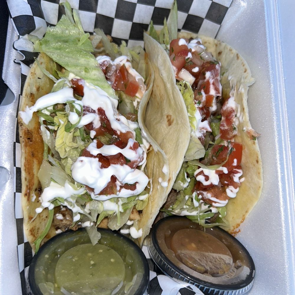 228 Cocina - two tacos in a styrofoam container - Mexican Near Me - Gulfport, Mississippi 228 Cocina - two tacos in a styrofoam container - Mexican Near Me - Gulfport, Mississippi