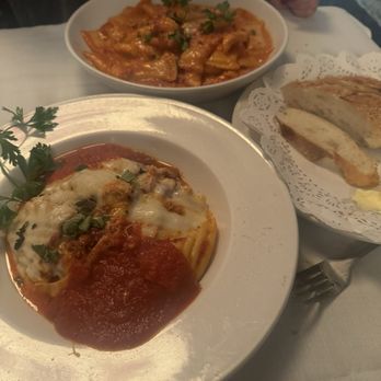Puglia Ristorante - Lasagna, Stuffed Rigatoni with Chicken, and complimentary Italian Bread with whipped butter. - Italian Near Me - New York, New York Puglia Ristorante - Lasagna, Stuffed Rigatoni with Chicken, and complimentary Italian Bread with whipped butter. - Italian Near Me - New York, New York