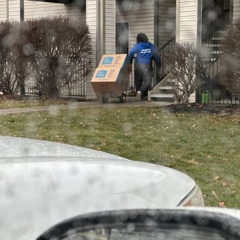 Grosse Pointe Moving & Storage - Paul with the large boxes even in the rain. - Movers Near Me - Detroit, Michigan Grosse Pointe Moving & Storage - Paul with the large boxes even in the rain. - Movers Near Me - Detroit, Michigan