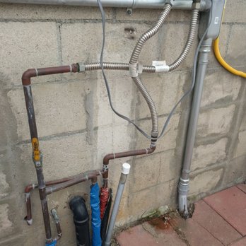 Done-Rite Plumbing And Rooter - This is what it looked like before. Notice the pipes aren't attached to the wall. Not OK. - Plumbing Near Me - Orange, California Done-Rite Plumbing And Rooter - This is what it looked like before. Notice the pipes aren't attached to the wall. Not OK. - Plumbing Near Me - Orange, California
