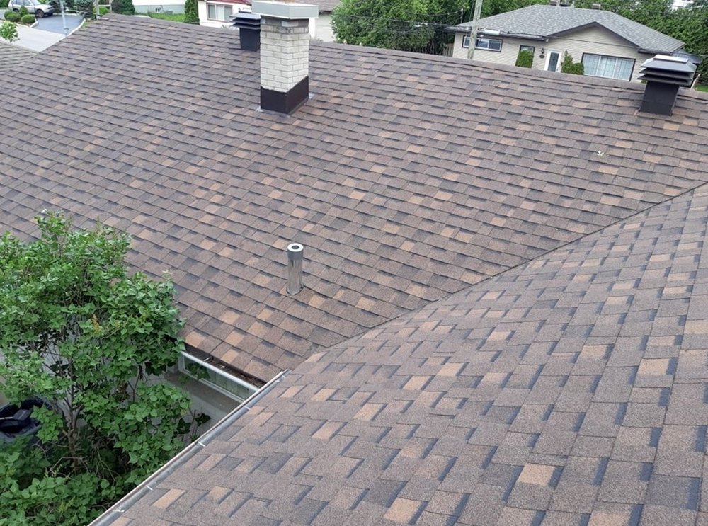 Slide of Bystrom Roofing